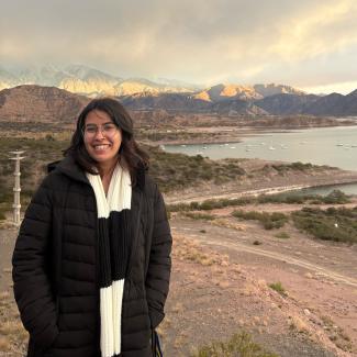 Amelia in front of mountains