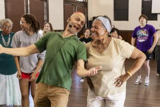 Fuad Elhage dancing with seniors